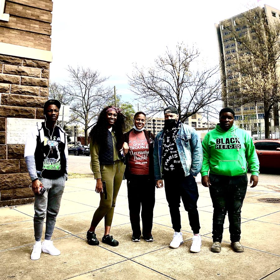 Young people posing outdoors