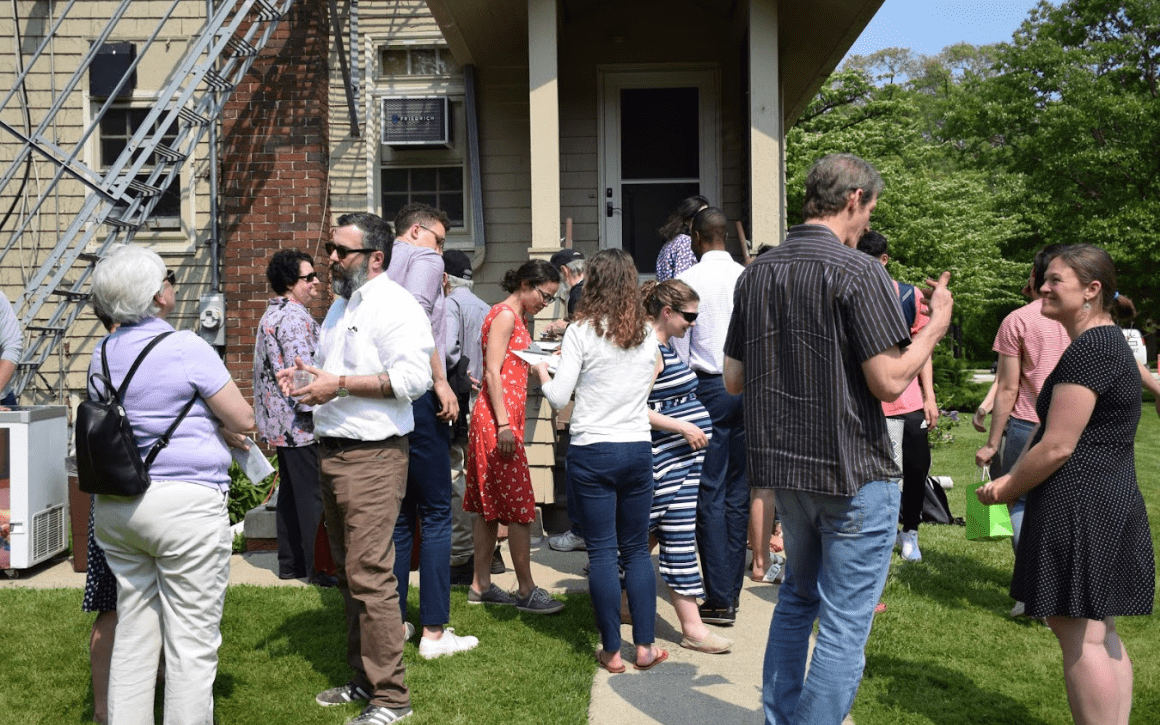 Group of people celebrating park building event